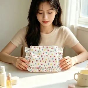 Close-up of a floral cosmetic bag with ruffled edges, ideal for daily beauty storage.