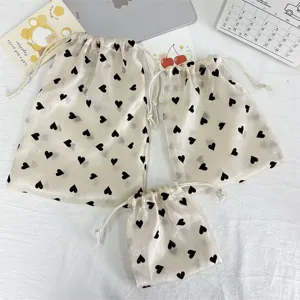 Champagne heart print drawstring storage pouch set, portable cosmetic and sundries organizer bag.