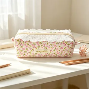 Korean style floral lace pencil pouch detail shot, cute pink stationery bag close up view.