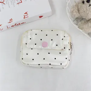 Cute polka dot coin purse with flap snap closure and zipper, mini portable card holder bag.