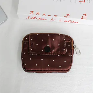 Brown polka dot coin purse mini wallet with flap pocket and zipper closure for daily use.