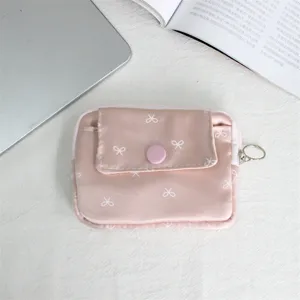Pink ribbon print small coin purse with flap snap closure and zipper, portable mini card holder.