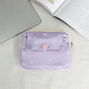 Mini purple bow print coin purse and card holder, portable fabric mini storage bag for daily use.