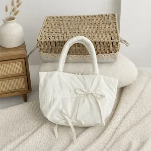 Borsa a mano plissettata minimalista con fiocco, grande shopper elegante da donna.