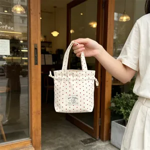 Bolso tipo saco de lona con cordón y bonito estampado de estrellas rojas, bolso casual.