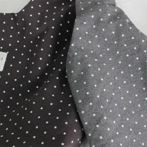 Close-up detail of Korean style star print tote bag, showing fabric texture and design.