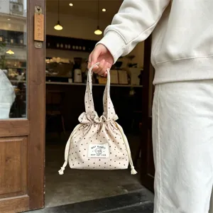 Bolso de mano con cordón de lona y estampado de estrellas, pequeña bolsa de almacenamiento.