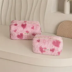 Roze pluche hart cosmetische tas set, schattig donzig make-up etui en grote reistas organisator.