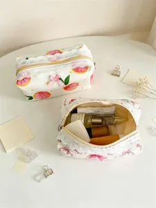 Cute lace cosmetic bag large capacity makeup pouch with fruit print and bowknot decor.