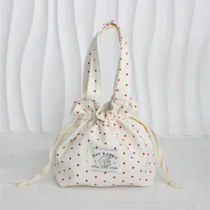 Bolsa de lona con cordón y estampado de estrellas rojas, bonita bolsa de almacenamiento y bolso.