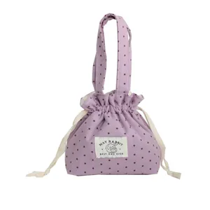 Bolso de mano con cordón de lona con estampado de estrellas moradas etiqueta de conejo lindo