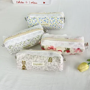 Detailed view of cute Korean floral lace pencil cases, fabric stationery pouch with zipper.