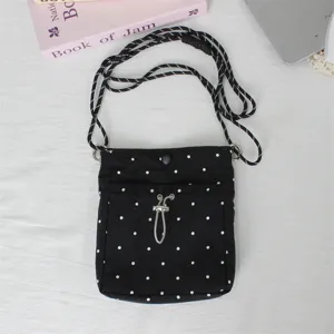 Schwarze Nylon Mini Umhängetasche mit weißen Punkten, lässige Handtasche für Alltag.
