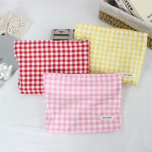 Bolsa de cosméticos de cuadros coloridos, estuche de maquillaje portátil de tela para viajes.