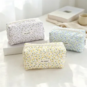 Cute quilted floral cosmetic bag, large capacity canvas makeup pouch for daily travel storage.