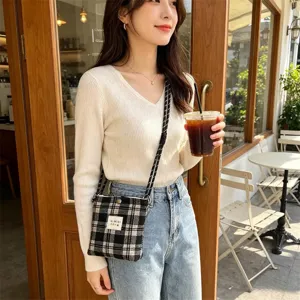 Retro black and white plaid mini crossbody bag, casual phone pouch for women daily street style.