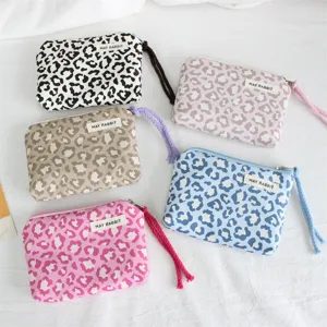 Leopard print zippered coin purse small portable storage bag for daily use and keys.
