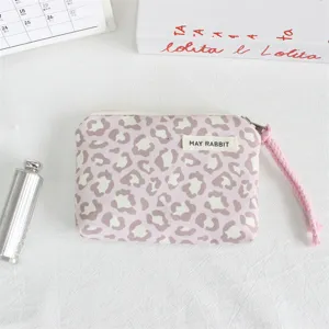 Pink leopard print canvas coin purse with zipper closure and portable wrist strap for daily use.