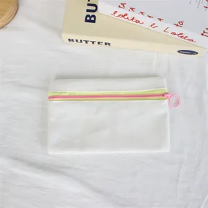 Simple white canvas pencil case with pink zipper and yellow trim, portable zipper storage pouch.