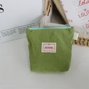 Green plaid nylon mini zipper pouch, portable coin purse and lipstick storage bag for daily use.
