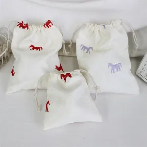 Korean minimalist embroidered pony drawstring bag, portable dustproof travel storage pouch.
