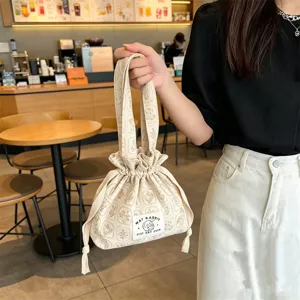 Sac à cordon en toile à fleurs mignon sac à main portable pochette de rangement cosmétique