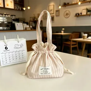 Pochette à cordon en toile sac à main rayé mignon sac de rangement mini portable quotidien.