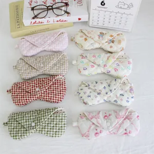 Cute quilted fabric glasses case with snap closure, portable storage pouch for daily use.