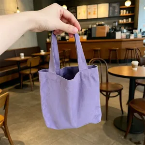 Solid color nylon mini tote bag, lightweight waterproof handbag for daily casual use.