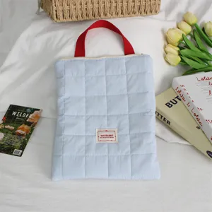Light blue quilted laptop sleeve bag with red handle soft padded tablet protective case