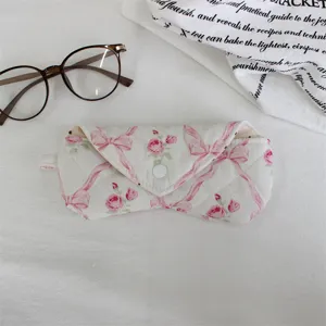 Soft quilted padded glasses case with pink ribbon and rose floral pattern for daily use.