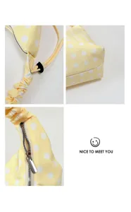 Yellow polka dot shoulder bag with adjustable gathered strap, stylish underarm bag for women