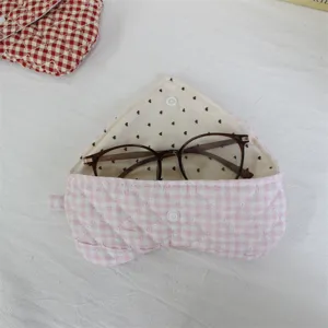 Pink gingham quilted triangular glasses case with cute design, soft fabric pouch for storage.