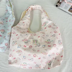 Detail shot of Korean style cute cartoon printed tote bag, pink gingham fabric, large capacity.