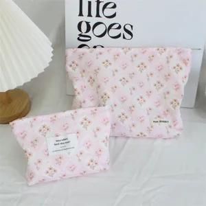 Cute pink corduroy floral cosmetic bag, portable zipper makeup pouch for women and girls daily use.