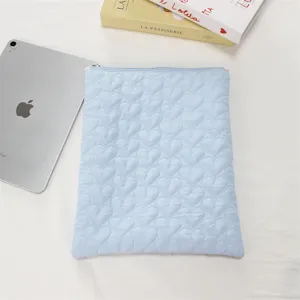 Light blue quilted heart tablet sleeve cute ipad storage bag soft aesthetic laptop pouch.