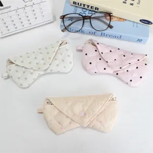 Soft quilted glasses case, padded portable sunglasses pouch, cute floral polka dot design.