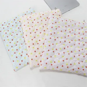 Cute quilted tablet sleeve with heart strawberry pattern, soft inner bag for iPad and laptop.