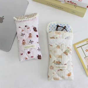 Quilted glasses storage pouch with cute cartoon bear pattern, soft portable protective case.