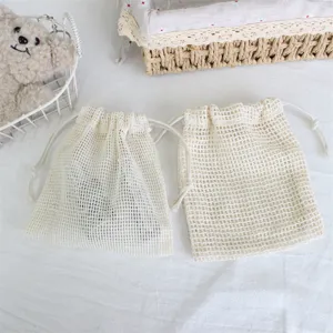 Cotton mesh drawstring bags for jewelry makeup storage and gift packaging, reusable small pouches.