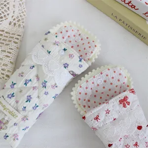 Quilted padded glasses storage bag soft portable protective cover with floral print and snap closure.