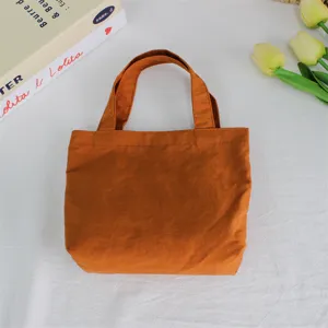 Solid color nylon small handbag mini tote bag lightweight waterproof bento lunch bag daily use.