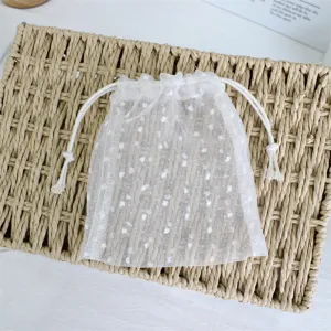 White sheer mesh drawstring bag for jewelry storage, cosmetic organizer and gift packaging.