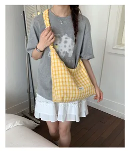 Yellow gingham slouchy shoulder bag with adjustable gathered strap, casual daily crossbody style.