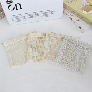 Daisy embroidery mesh drawstring bags for jewelry makeup gifts storage and party favors packing.