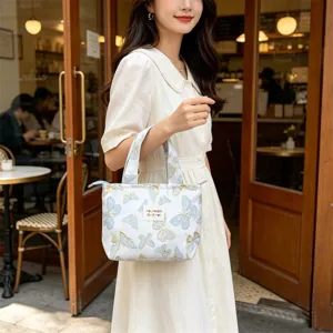 Ins vintage embossed jacquard bento bag, large capacity canvas handbag for daily use.