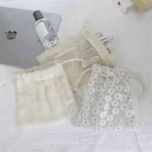 Daisy embroidery mesh drawstring pouch set, lightweight cosmetic jewelry storage bag organizer.