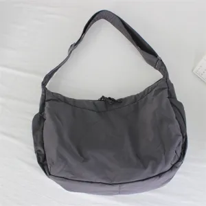 Borsa a tracolla casual a grande capacità, borsa dumpling leggera per il commuting quotidiano.