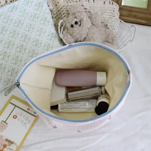 Corduroy floral cosmetic bag, cute ins-style portable makeup pouch, large capacity organizer.
