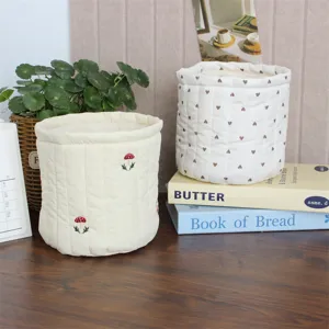 Korean ins-style quilted fabric storage basket, desktop organizer for snacks, toys, and cosmetics.